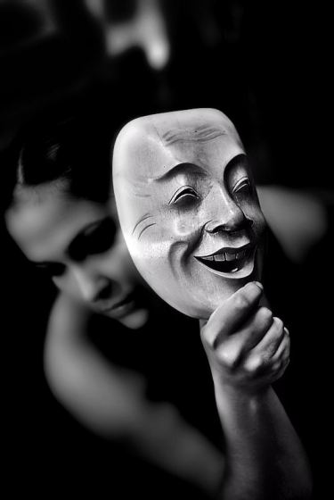 woman-behind-mask